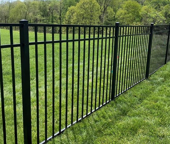 Black ornamental aluminum fence installed by ProGuard Fencing