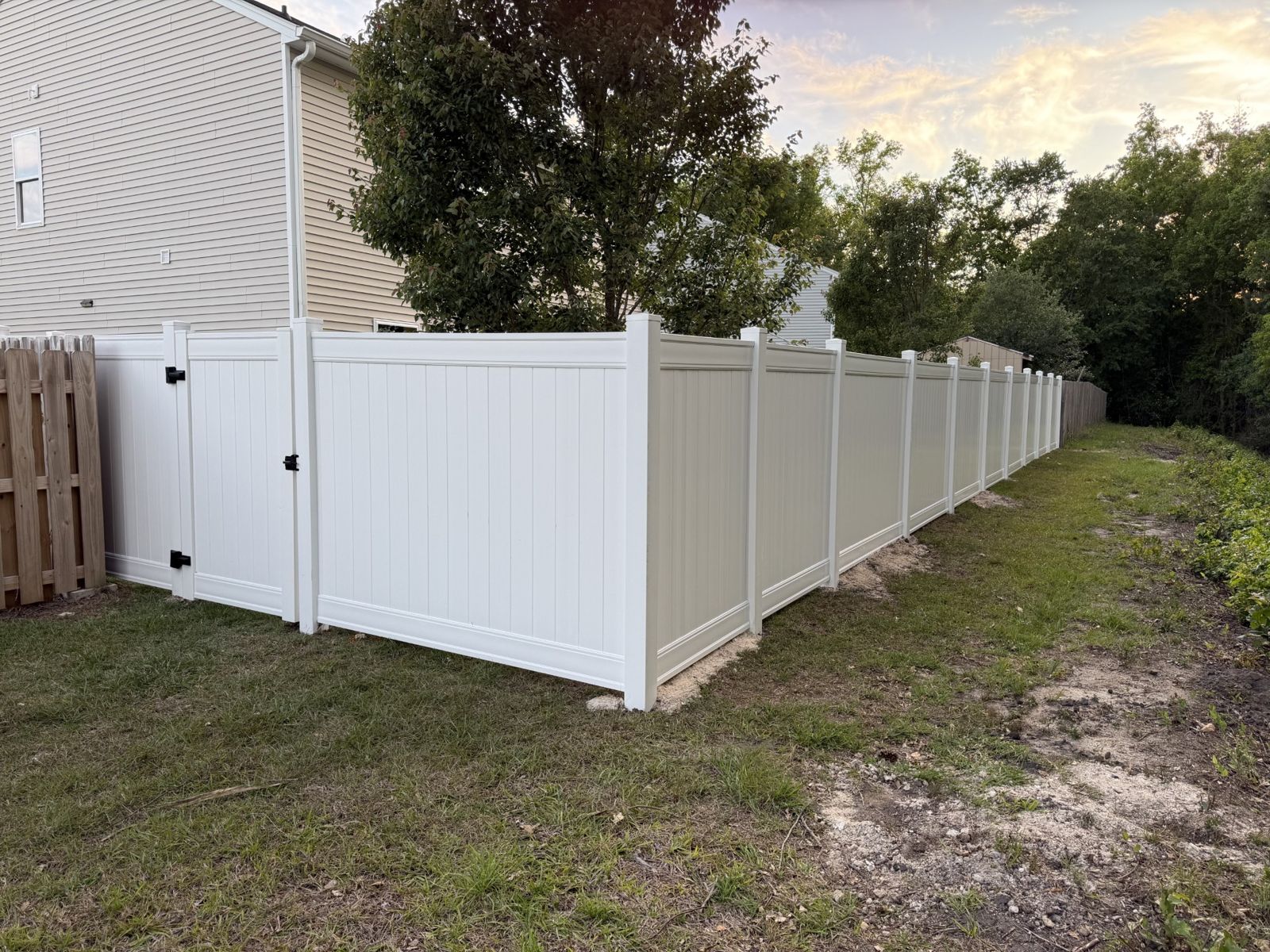 Vinyl privacy fence installation